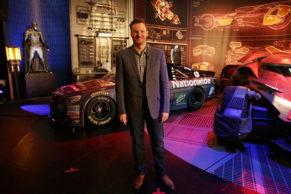 Dale Earnhardt Jr. poses in front of his "Batman v Superman: Dawn of Justice" film-inspired No. 88 Batman Chevrolet at Warner Bros. Studios on Thursday, March 17, 2016, in Burbank, CA. (Photo by Eric Charbonneau/Invision for Warner Bros./AP Images)