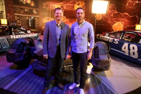 Dale Earnhardt Jr. and Jimmie Johnson pose in front of "Batman v Superman: Dawn of Justice" film-inspired No. 88 Batman Chevrolet and No. 48 Superman Chevrolet at Warner Bros. Studios on Thursday, March 17, 2016, in Burbank, CA. (Photo by Eric Charbonneau/Invision for Warner Bros./AP Images)