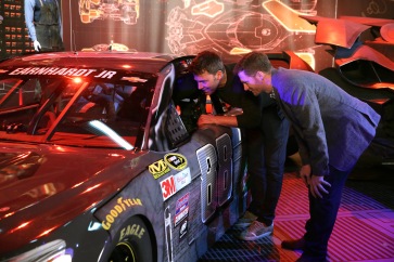 "Batman v Superman: Dawn of Justice" star Ben Affleck gets an in-depth look at Dale Earnhardt Jr.'s film-inspired No. 88 Batman Chevrolet at Warner Bros. Studios on Thursday, March 17, 2016, in Burbank, CA. (Photo by Eric Charbonneau/Invision for Warner Bros./AP Images)